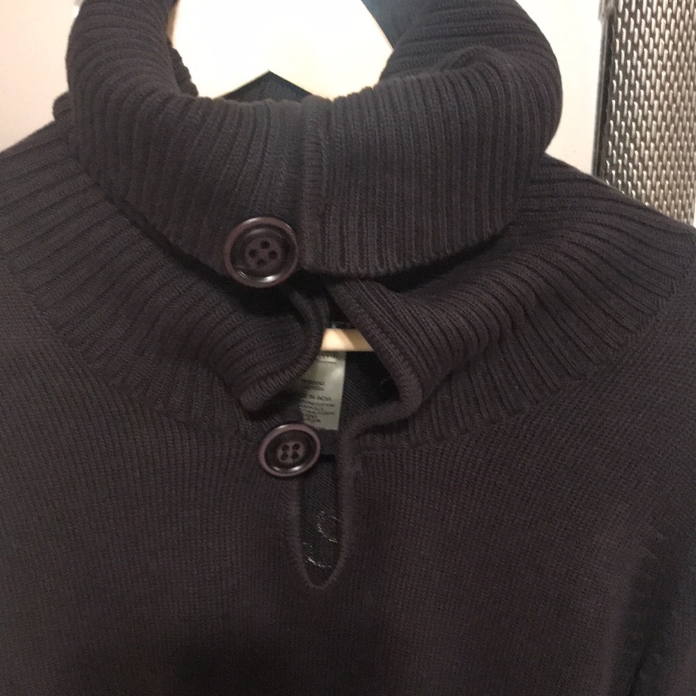 Diesel embroidered knit sweater. 3 adjustable buttons to change neck line